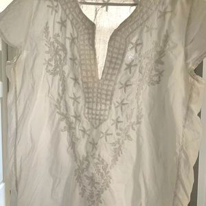Coastal white blouse with starfish.